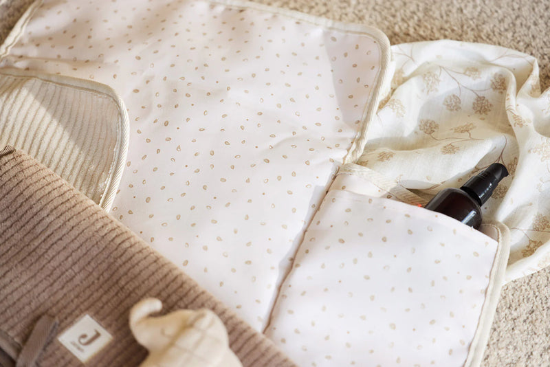 Changing Pad With Storage Pockets