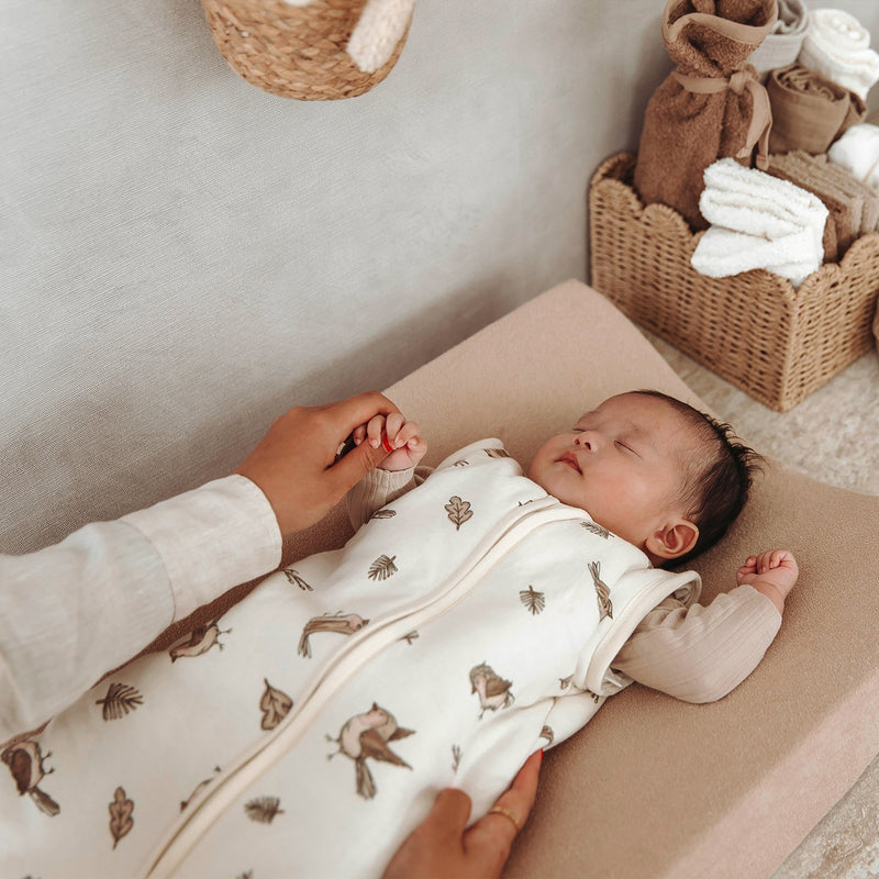 Baby on the Meyco Sand terry changing pad cover
