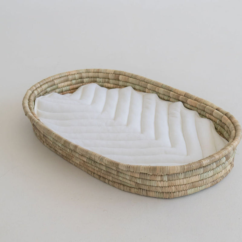 Ko-Coon changing basket with milky white quilted padding