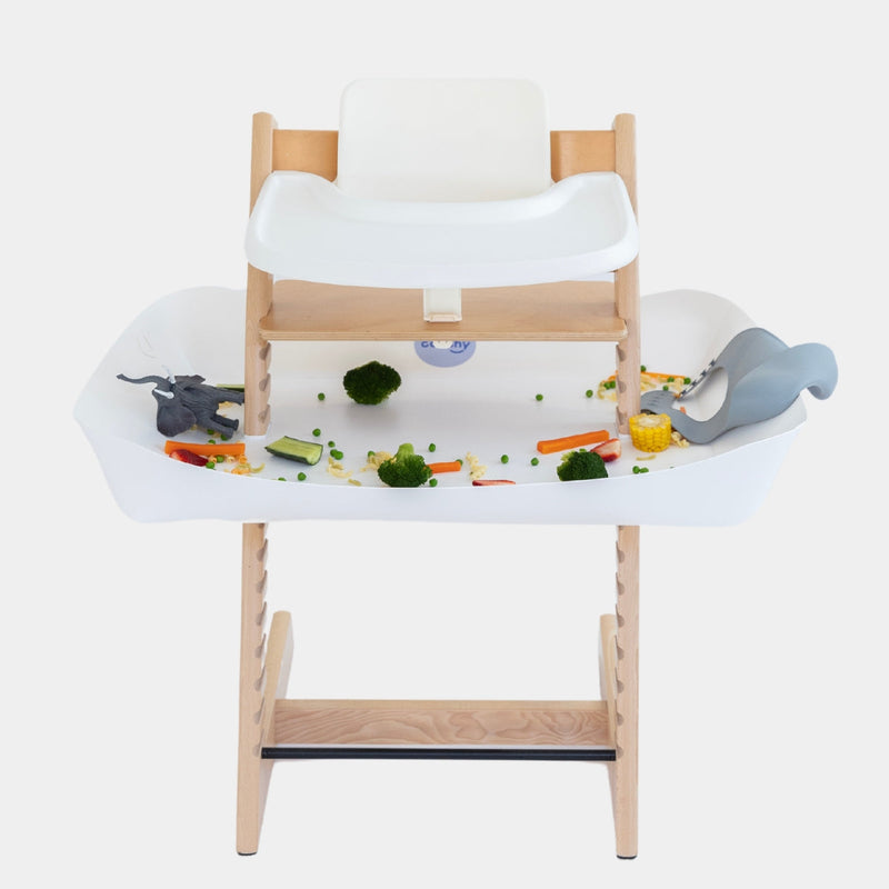 Catchy food catcher in White fitted to a Stokke Tripp Trapp high chair