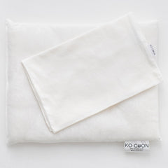 Ko-Coon milky white baby pillowcase folded
